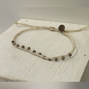 Pura Vida Solid Off-White Braided Rope Band with Dangling Copper Balls